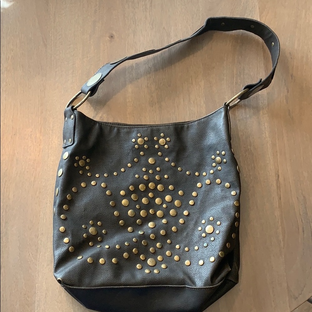 Gorgeous woman’s hobo style handbag